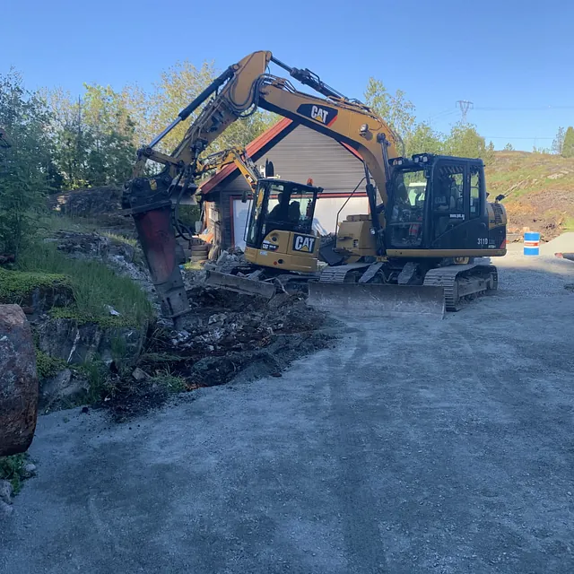 Gravemaskin i arbeid