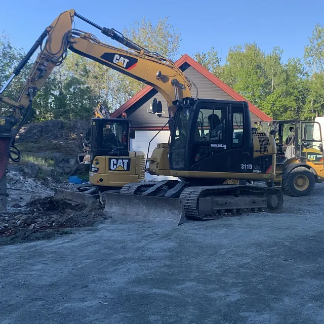 Gravemaskin i arbeid